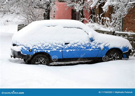 Photo Of A Car Covered In A Thick Layer Of Snow Consequences Of Heavy