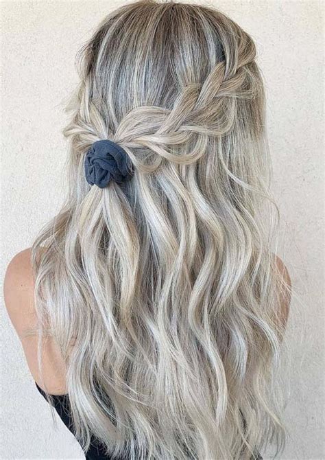 This braided half up half down 'do is looking for curly hairstyles for medium hair? Gorgeous Tied up Braided Hairstyles for Long Hair in 2019 ...