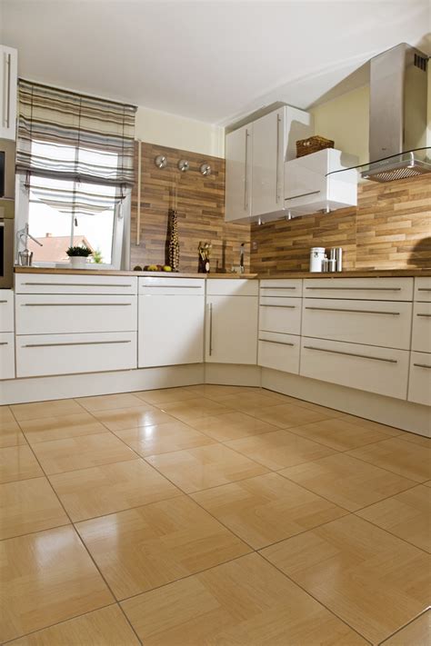 Wood look porcelain tiles are engineered to give kitchen floors a natural warmth and feel that can withstand spills and stains. Flooring | Brisk Living