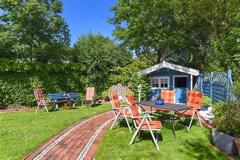 Unser haus bietet ihnen insgesamt 2 komfortable ferienwohnungen. Fotos - Haus und Garten - Haus Sand am Meer in ...