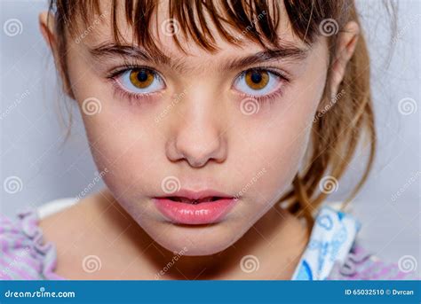 Portrait Close Up Of A Beautiful Little Girl With Amazing Brown Stock