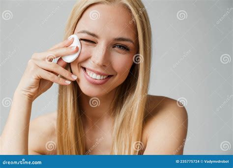 Half Naked Blonde Woman Winking While Using Cotton Pad Foto De Archivo Imagen De Cara Joven