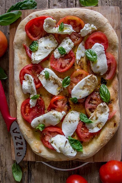So tried this simple bread pizza and my kids were standing near the oven and they were now and then checking whether it got cooked. Easy Caprese No Yeast Pizza Dough - A Perfect Fresh Ingredient Pizza