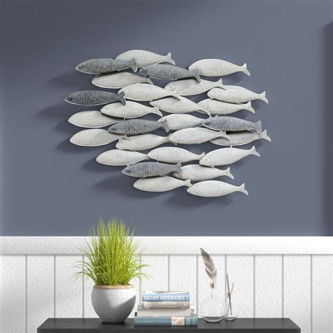 Upholstered stools are perfect little accents for the living room. School Of Fish Wall Decor | Wayfair
