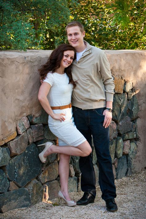 The happy couple is about to drop a lot more money just so you can bring someone to hang out with at their wedding — do them. Couple posing for their engagement pictures - Mountain ...