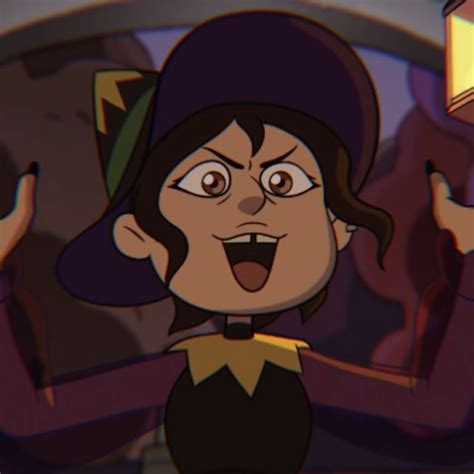 An Animated Image Of A Woman In A Witches Costume With Her Hands Up And Eyes Wide Open