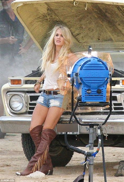 Carrie Underwood Flashes Toned Legs In Daisy Dukes As She Films Video