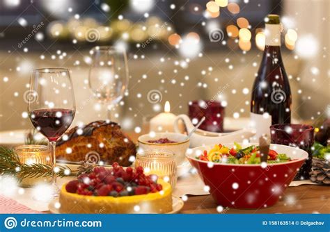 Food And Drinks On Christmas Table At Home Stock Photo Image Of Snow
