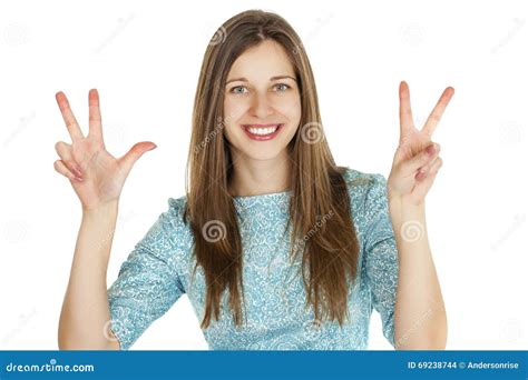 Young Smiling Brunette Woman Showing Victory Or Peace Sign Stock Photo