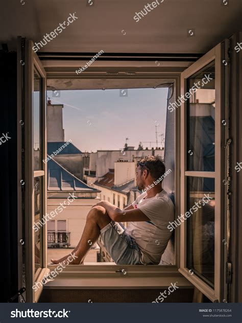 Young Man Sitting Window Looking Out Stock Photo 1175878264 Shutterstock