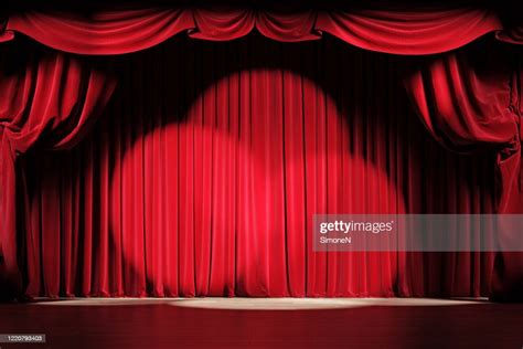 Theater Stage With Red Velvet Curtains And Spotlights High Res Stock