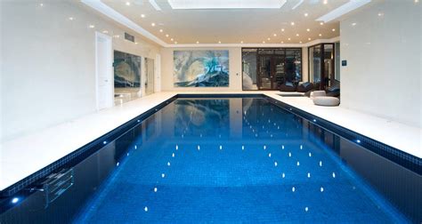 Indoor pool design ideas written by doityourself staff. Indoor Swimming Pool Design & Construction | Indoor ...