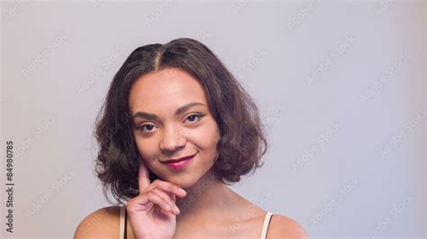 Mulatto Girl Touching Her Chin With Fingers Stock Video Adobe Stock