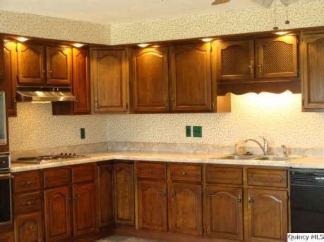 How to take your oak cabinets and turn them into custom cabinets using paint! Oak cabinets. Needs new counter tops, handles, black ...