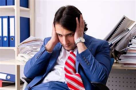 The Young Businessman Employee Unhappy With Excessive Work Stock Image Image Of Office
