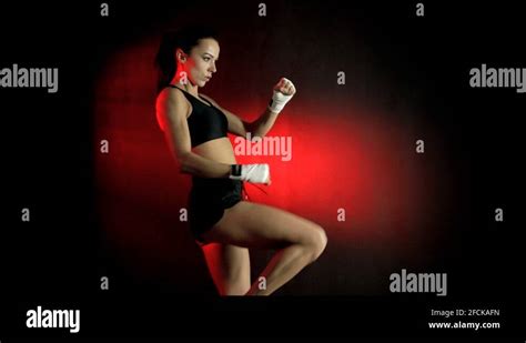 Female Mixed Martial Arts Fighter Practices Throwing Knees Stock Video Footage Alamy