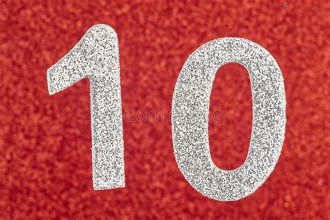 Number Ten Silver Color Over A Red Background Anniversary Stock Photo