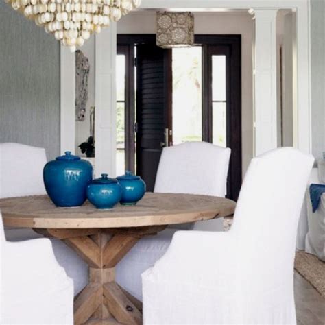 Dining room chairs & benches our collection of coastal dining chairs, beach dining chairs and benches are crafted from the finest plantation grown mahogany, select hardwoods or even solid pine. White chairs and weathered table | Coastal dining room, Home decor, House interior