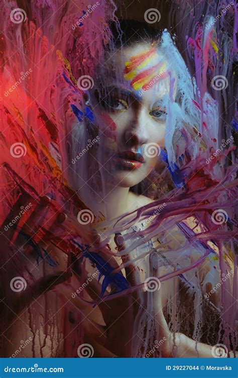 Beautiful Girl In Color Paint Splash Behind The Painted Color Glass