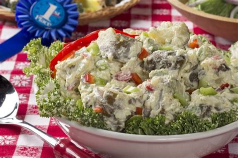 This flavorful taco salad is made with ground beef, vegetables, and tasty toppings including guacamole, sour cream, and shredded cheese. Award-Winning Potato Salad | Recipe | Potatoe salad recipe, Salad recipes, Potato salad