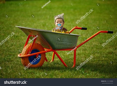 Cute Little Boy Sitting Wheelbarrow Stock Photo 414130888 Shutterstock