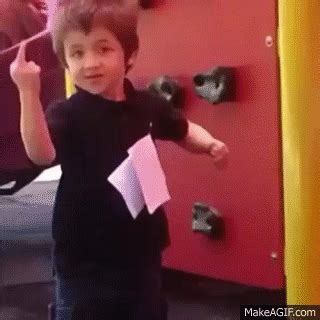 kid on playground shows off middle finger FUNNY on Make a GIF