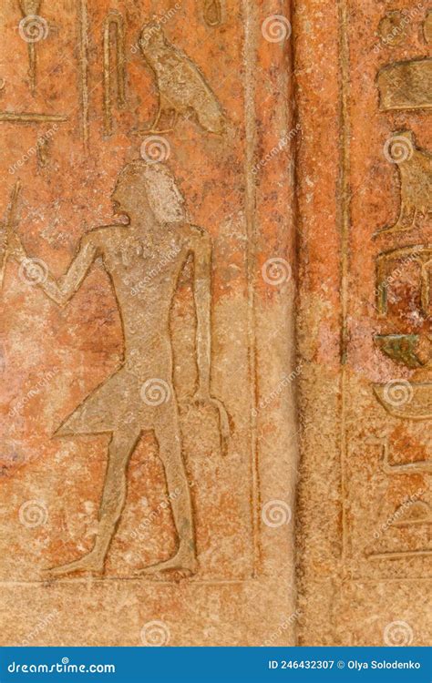 Ancient Egyptian Paintings And Hieroglyphs Carved On Stone Wall