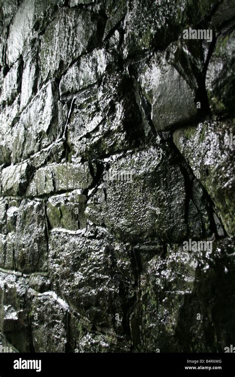 Detail Of Dark Damp Wet Stone Wall In Alley Way Stock Photo Alamy