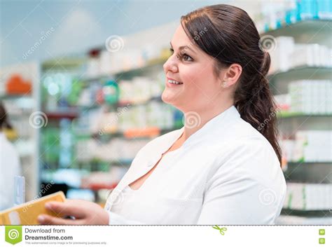 Sales Woman In Pharmacy Or Drug Store Stock Photo Image Of Pharmacy