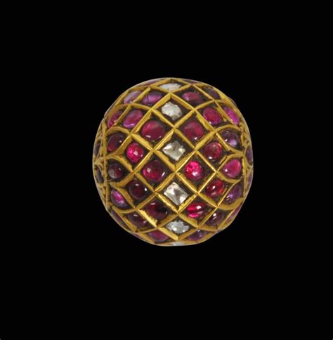 South Indian Gold Spherical Pendant Set With Rubies And Diamonds