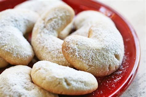 Learn how to make almond christmas cookies. Almond Crescent Cookies Recipe | SimplyRecipes.com
