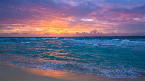 Download Wallpaper 2560x1440 Seaside Dawn Sea Waves Sand Sky
