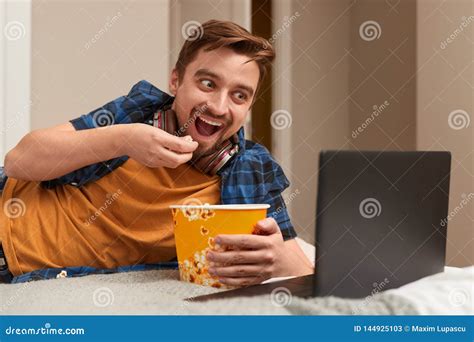 Excited Man Eating Popcorn And Watching Movie Stock Image Image Of