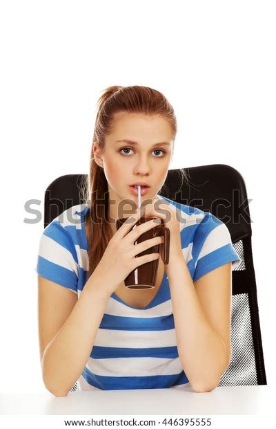 Teenage Woman Drinking Something Through Straw Stock Photo 446395555
