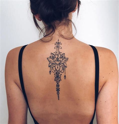 Tattoos On Back In 2020 Tattoos Spine Tattoos For Women Neck Tattoo