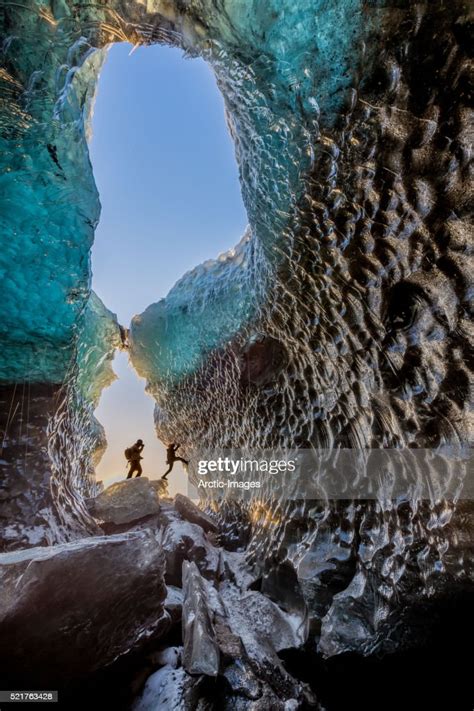 Exploring An Ice Cave On Svinafellsjokull Glacier In Skaftafell