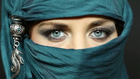 Portrait Of An Arabic Young Woman With Her Beautiful Blue