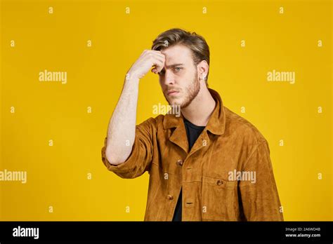 Blonde Good Looking Guy With Green Eyes Looks Confused Stock Photo Alamy