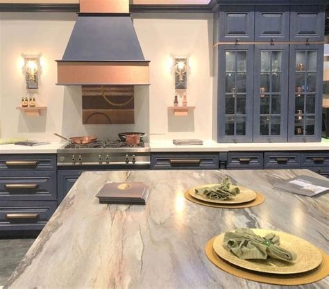 Kitchen backsplash with dark cabinets and dark countertops. color for 2018 is dark blue kitchen cabinets at KBIS with ...