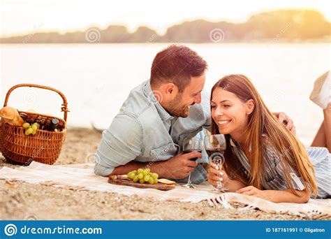 Young Couple Having A Picnic At The Beach Stock Image Image Of Food Away 187161991