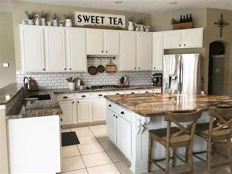 For the kitchen cabinet wood stain colors that revels in creamy shades and chrome finishes go for the crisp white curtains. 10 Ways to Decorate Above Your Kitchen Cabinets