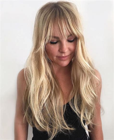 Long Layered Blonde Haircut With Bangs Large Forehead Hairstyles