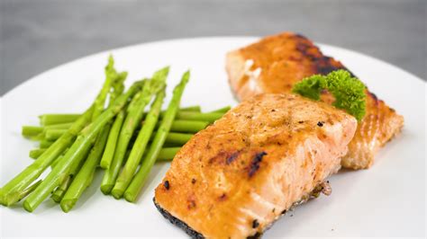 If you are baking salmon fillets, cook it at 450 degrees f (232 degrees c). 3 Ways to Cook Frozen Salmon - wikiHow