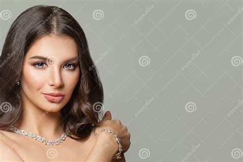 Perfect Brunette Woman Face Girl With Makeup Long Hair And Diamond Jewelry Stock Image Image