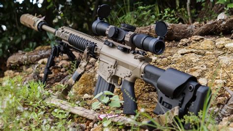Black And Brown Assault Rifle With Scope Gun Rifles Sniper Rifle