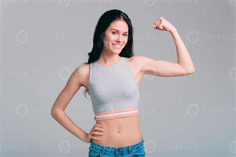 Confident In Her Body Attractive Young Sporty Woman Showing Her Bicep