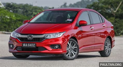 Find specs, price lists & reviews. GALLERY: Honda City 1.5L V in Passion Red Pearl - paultan.org