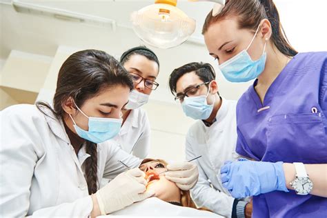 Female Dentist Doctor Teaching Students Hardy Pediatric Dentistry