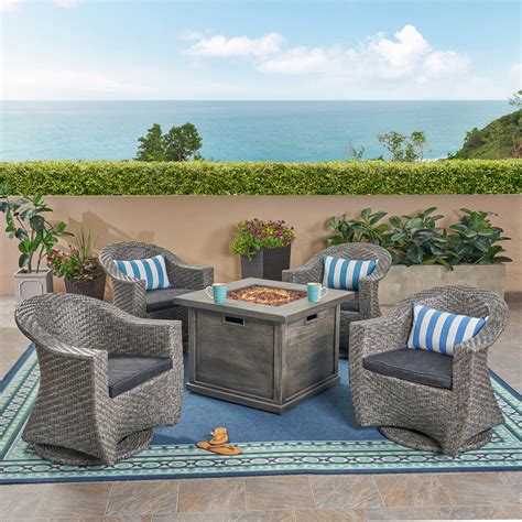 If yes, then you'll definitely need to have a set of comfortable chair so that you can spend a good amount of time with your friends or relatives. Celeste Patio Fire Pit Set, 4-Seater with Wicker Swivel ...