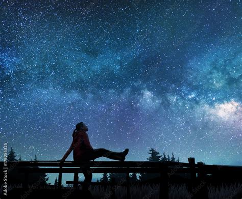 Girl Watching The Stars In Night Sky Stock Photo Adobe Stock